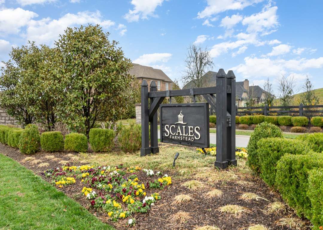 A welcome sign for Scales Farmstead