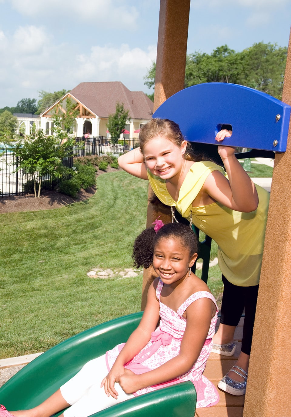 Two kids playing at a park